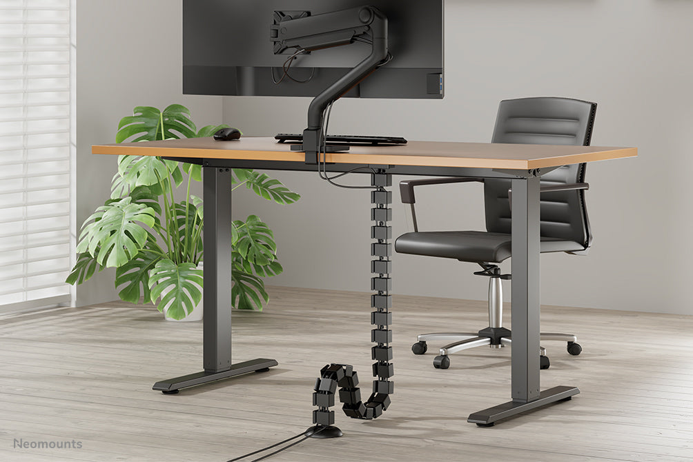 Neomounts Cable Spine Organizer for sit/stand desk frames magnet mounted black