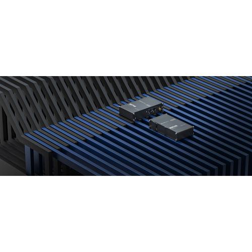 Compact industrial Ethernet router equipped with two Ethernet ports DIN rail bracket and an industrial 3-pin connector.